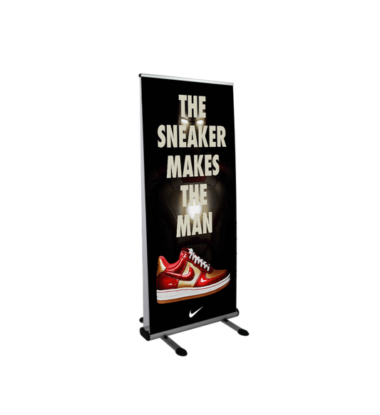 Roll-up banner with sneaker graphic and text on a stand